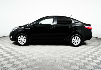 Подержанный автомобиль Kia Rio Sedan 2012 года (3 фото)