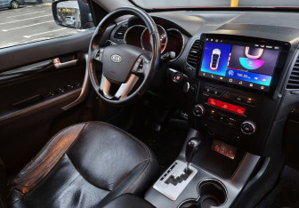 Подержанный автомобиль Kia Sorento 2009 года (10 фото)