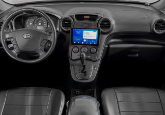 Подержанный автомобиль Kia Carens 2011 года (11 фото)