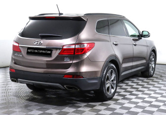 Подержанный автомобиль Hyundai Santa Fe 2014 года (3 фото)