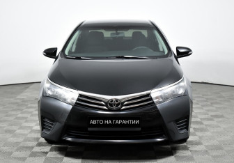 Подержанный автомобиль Toyota Corolla Sedan 2013 года (2 фото)