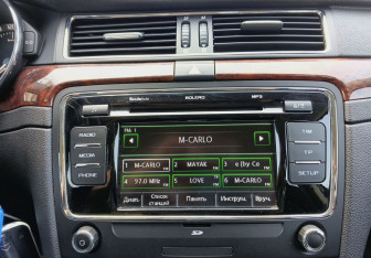 Подержанный автомобиль Skoda Superb Wagon 2012 года (14 фото)