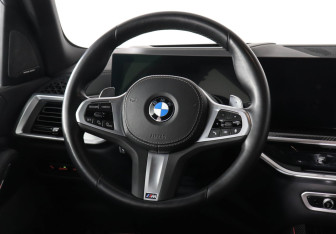 Подержанный автомобиль BMW X5 2023 года (15 фото)