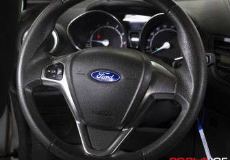 Подержанный автомобиль Ford Fiesta Sedan 2015 года (16 фото)