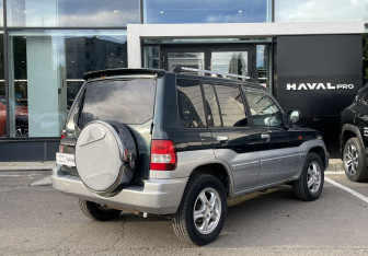 Подержанный автомобиль Mitsubishi Pajero Pinin 2004 года (5 фото)
