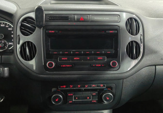 Подержанный автомобиль Volkswagen Tiguan 2014 года (13 фото)