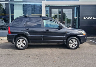 Подержанный автомобиль Kia Sportage 2010 года (4 фото)