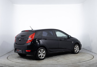 Подержанный автомобиль Hyundai Solaris Hatchback 2012 года (5 фото)