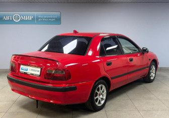 Подержанный автомобиль Mitsubishi Carisma Sedan 1999 года (5 фото)