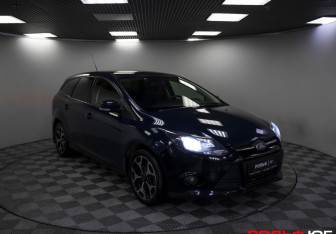 Подержанный автомобиль Ford Focus Wagon 2013 года (19 фото)
