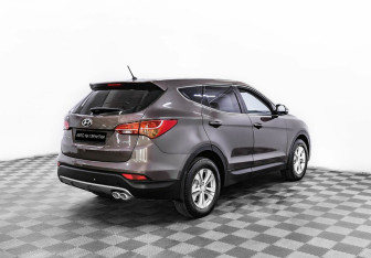 Подержанный автомобиль Hyundai Santa Fe 2014 года (3 фото)