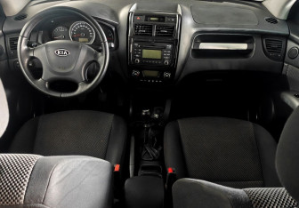 Подержанный автомобиль Kia Sportage 2010 года (11 фото)