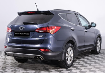 Подержанный автомобиль Hyundai Santa Fe 2014 года (3 фото)