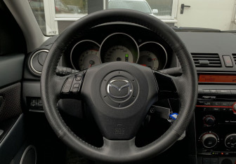 Подержанный автомобиль Mazda 3 Sedan 2008 года (14 фото)