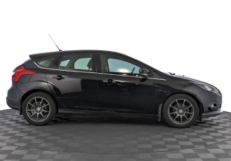 Подержанный автомобиль Ford Focus Hatchback 2014 года (4 фото)