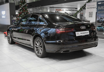Подержанный автомобиль Audi A6 Sedan 2015 года (6 фото)