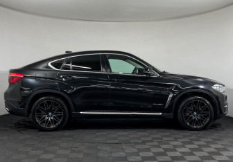 Подержанный автомобиль BMW X6 2017 года (6 фото)