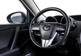 Подержанный автомобиль Mazda 3 Hatchback 2009 года (16 фото)