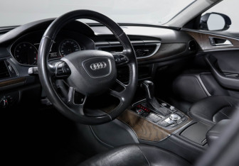 Подержанный автомобиль Audi A6 Sedan 2015 года (14 фото)