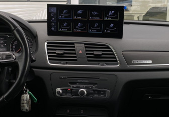 Подержанный автомобиль Audi Q3 2014 года (12 фото)