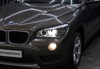 Подержанный автомобиль BMW X1 2013 года (22 фото)