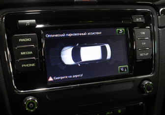 Подержанный автомобиль Skoda Superb Liftback 2014 года (23 фото)