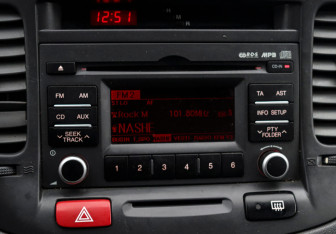 Подержанный автомобиль Kia Rio Sedan 2010 года (12 фото)