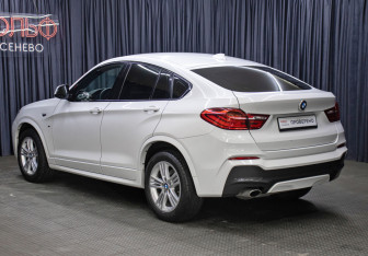 Подержанный автомобиль BMW X4 2016 года (7 фото)