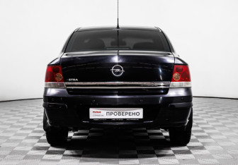 Подержанный автомобиль Opel Astra Sedan 2011 года (6 фото)