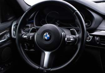 Подержанный автомобиль BMW X6 2014 года (15 фото)