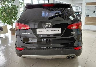 Подержанный автомобиль Hyundai Santa Fe 2014 года (6 фото)