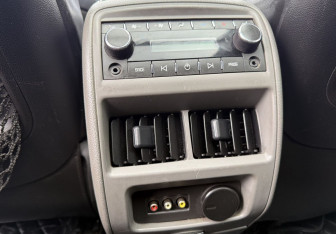 Подержанный автомобиль Cadillac SRX 2010 года (12 фото)