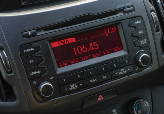 Подержанный автомобиль Kia Sportage 2012 года (13 фото)