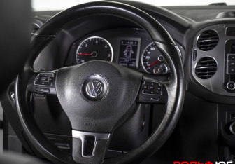 Подержанный автомобиль Volkswagen Tiguan 2014 года (12 фото)