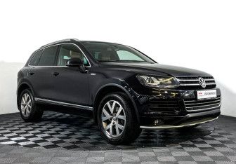 Подержанный автомобиль Volkswagen Touareg 2014 года (3 фото)
