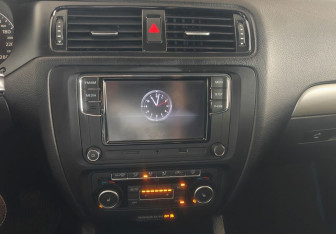 Подержанный автомобиль Volkswagen Jetta Sedan 2011 года (13 фото)