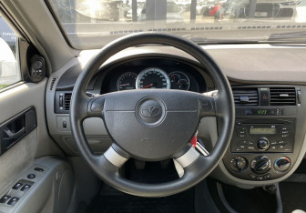 Подержанный автомобиль Daewoo Gentra Sedan 2014 года (12 фото)