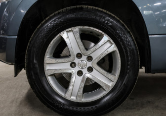 Подержанный автомобиль Suzuki Grand Vitara 2005 года (19 фото)