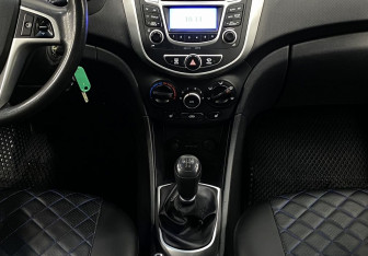 Подержанный автомобиль Hyundai Solaris Sedan 2014 года (12 фото)