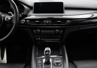 Подержанный автомобиль BMW X6 2015 года (14 фото)