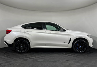 Подержанный автомобиль BMW X6 2018 года (6 фото)