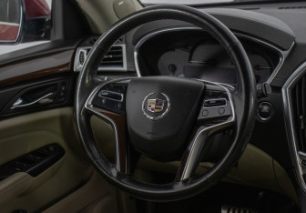 Подержанный автомобиль Cadillac SRX 2013 года (15 фото)