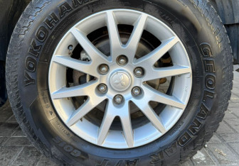 Подержанный автомобиль Mitsubishi Pajero Sport 2009 года (14 фото)