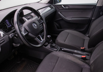 Подержанный автомобиль Skoda Rapid Liftback 2014 года (10 фото)