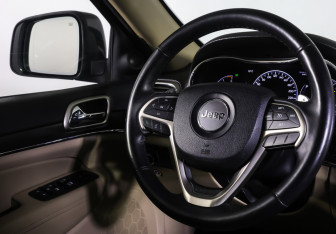 Подержанный автомобиль Jeep Grand Cherokee 2014 года (12 фото)