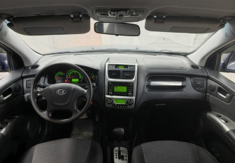 Подержанный автомобиль Kia Sportage 2009 года (10 фото)