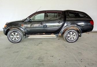 Подержанный автомобиль Mitsubishi L200 2008 года (7 фото)