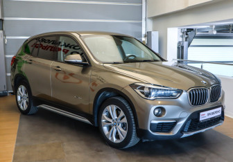Подержанный автомобиль BMW X1 2016 года (3 фото)
