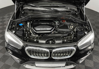 Подержанный автомобиль BMW X1 2018 года (10 фото)