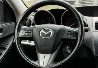 Подержанный автомобиль Mazda 3 Sedan 2012 года (14 фото)